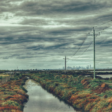 Cloudy sky over a creek