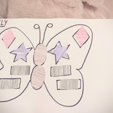 A child's drawing of a butterfly