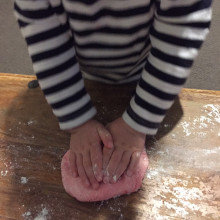 child making pink playdough
