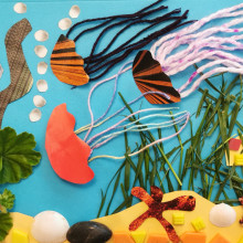 A child's underwater themed collage, with two jellyfish