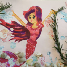 A child's underwater themed collage, with a mermaid