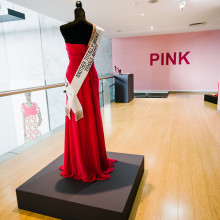 PINK Installation view looking towards the stairs with the dress from Anastasia Klose’s performance piece Miss Spring 1883 (2016) in the foreground. Photography: EP Group Australia