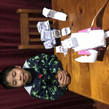 Alexander with his paper minecraft creations