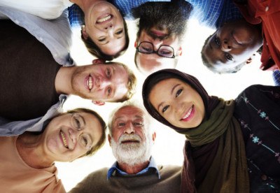 a group of people looking at the camera