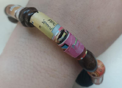 A Friendship bracelet made from paper and beads