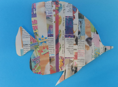 a fish made of recycled newspaper & magazines