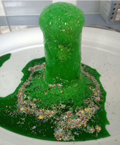 a tower of green glitter
