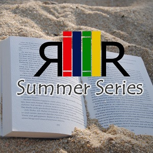 A book open on sand with the Recently Returned Summer Series logo over it.