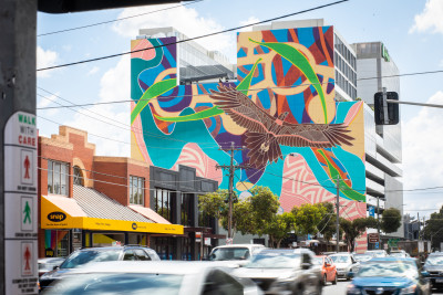 Large-scale mural artwork on the Hunter Building