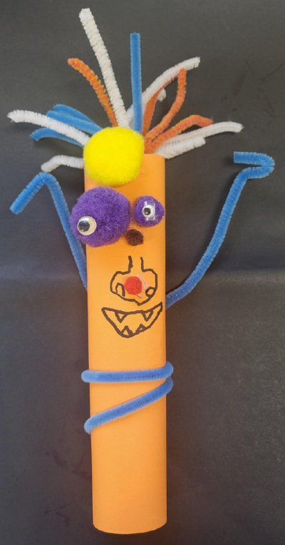 an alien made from paper and craft supplies