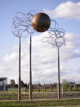 Acquired by: One Per Cent for Art, capital works About the Artwork: "Conundrum was made to provide a landmark for the local community and in particular to provide a gateway to the Grange Community Centre. The conceptual framework for the sculpture revolves around the symbolic interpretations of the sphere which can be viewed universally as a celestial body or microscopically as atomic particles. The sphere can also be seen as an essential element in the science of motion, as in bearings, wheels, and the u