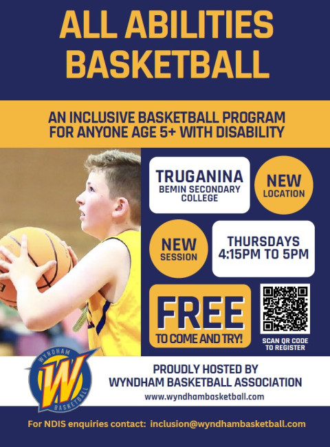 a boy is throwing a ball at a basket