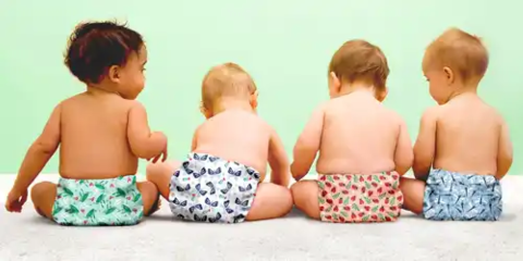 Babies sitting in their cloth nappies 