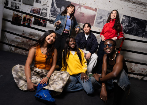 A diverse group of young people smiling