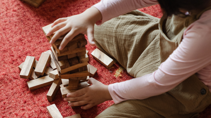 Girl playing with blocks