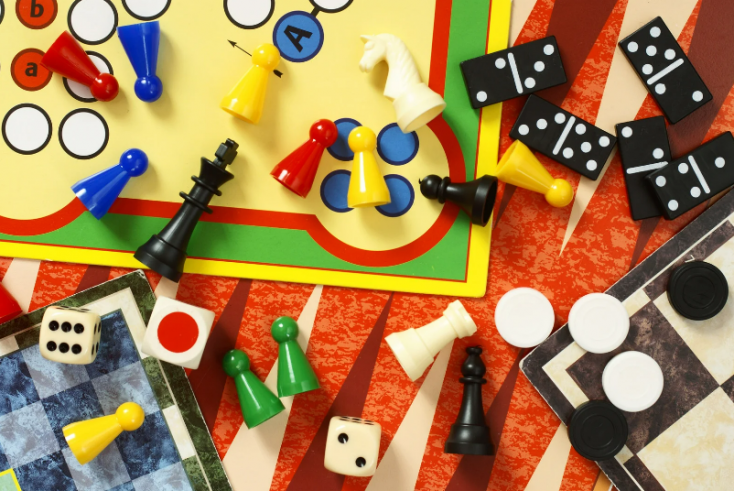 Board game pieces scattered on a table