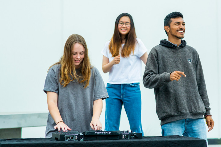 Three young people dancing