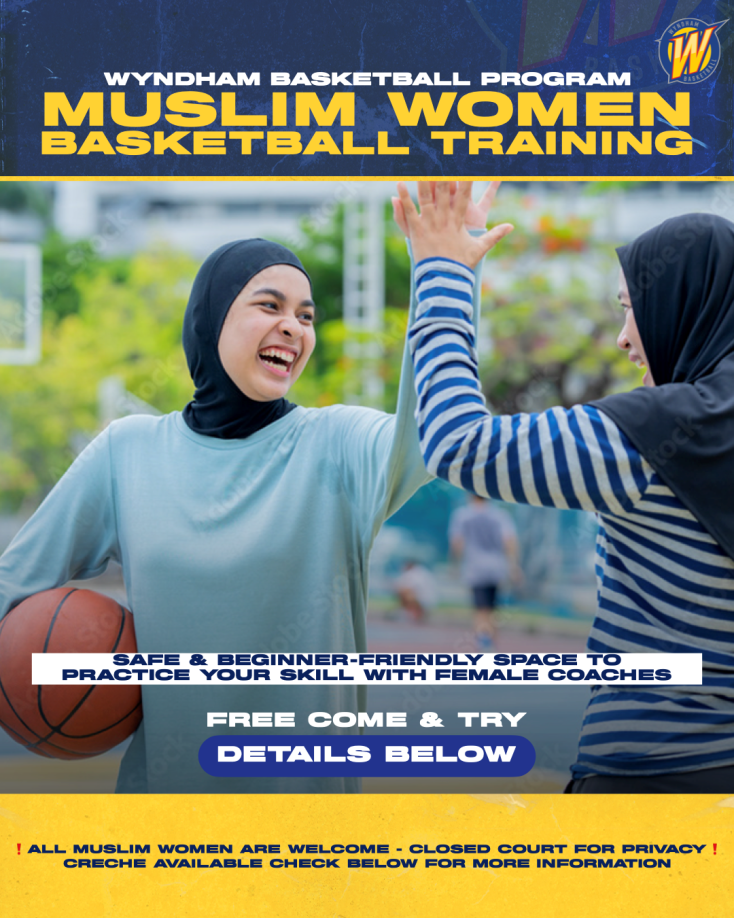 two women wearing hijab are high fiving, one is holding a basketball