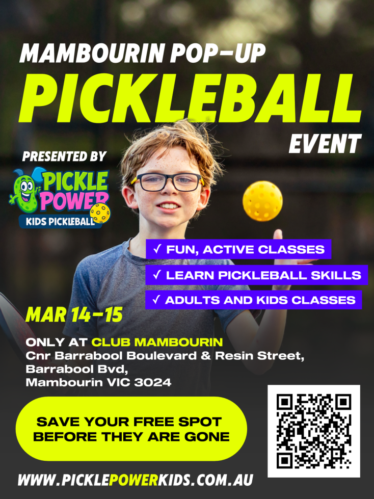 a boy is throwing a yellow ball into the air and smiling at the camers