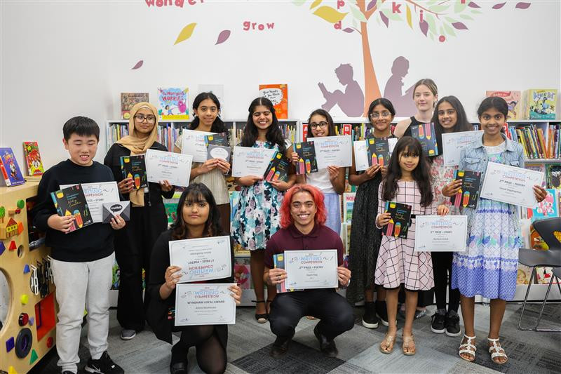Winners hold their certificates for Imagination Creation Competition