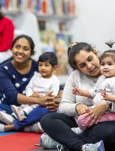 Parents and children enjoying rhyme time