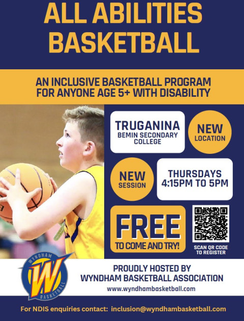 a boy is throwing a ball at a basket