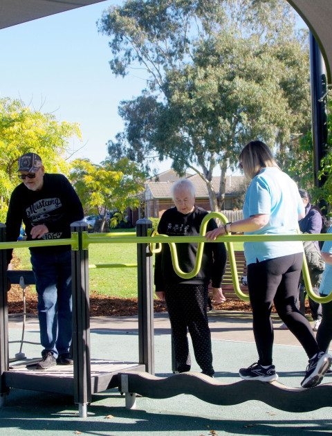 Older Adults trailing the exercise park equipment
