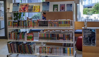 2 bays of white bookshelves at the Saltwater community centre