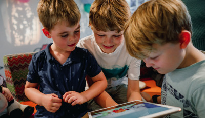 some children with an ipad