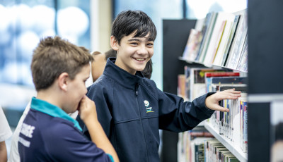 young people at the shelves