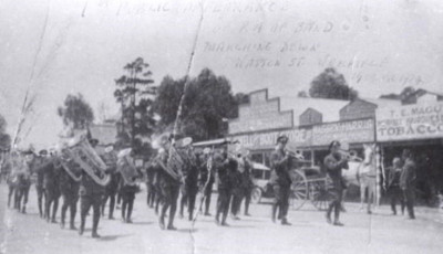 black and white photograph of a band on watton street