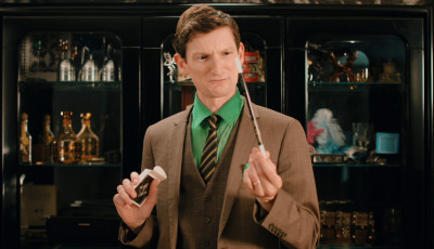 A man holding a magic wand.
