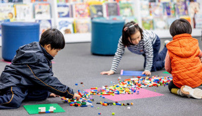 Kids playing Lego.