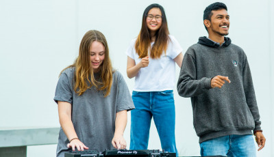 Three young people dancing 
