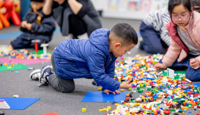 Kids playing with Lego.