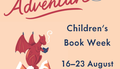 Book Week 2025 logo with the words 'Book an Adventure'. A red dragon sits on a mountain reading from a pile of novels.