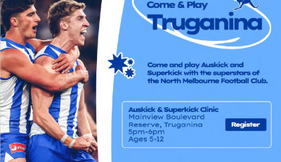 two men in blue and white sports kit are celebrating