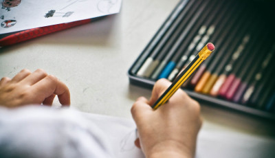 Child drawing on paper