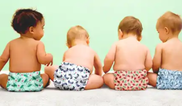Babies sitting in their cloth nappies 