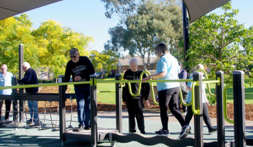 Older Adults trailing the exercise park equipment